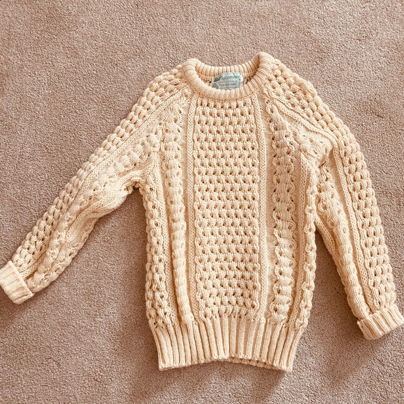 Cream colored cable knit small sweater. - Picture 1 of 3